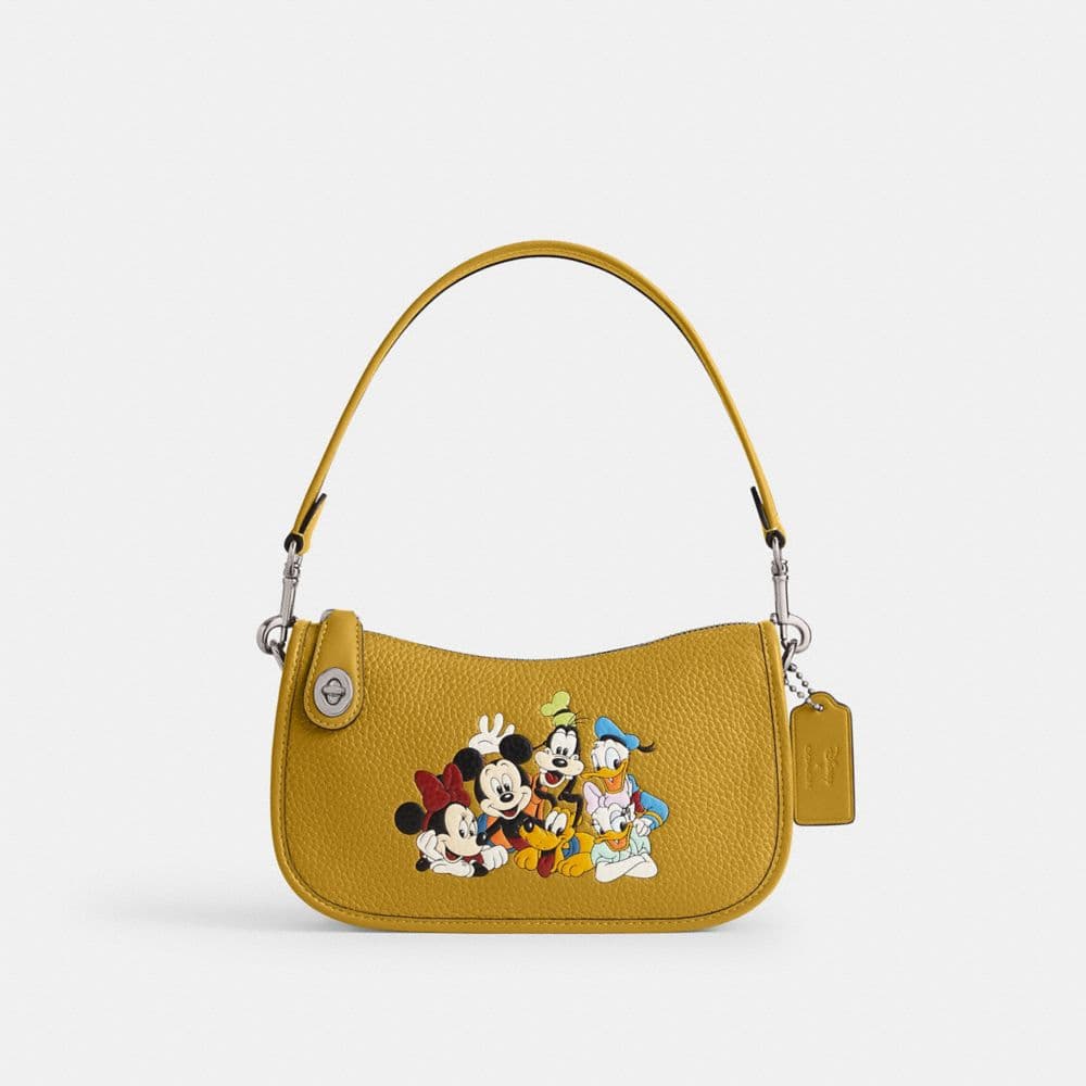 Disney X Coach Swinger Bag In Regenerative Leather With Mickey Mouse And Friends